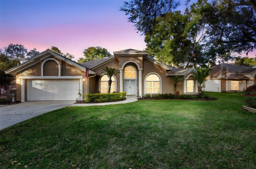Spacious 4-bedroom, 3-bath split-plan home with a kitchen-centered, open floorplan in the desirable Hammocks community of Ocoee. This light-filled home features a cozy wood-burning fireplace, luxury vinyl flooring throughout, and a brand-new roof and A/C—offering both style and peace of mind. Designed for comfortable everyday living and easy entertaining, enjoy seamless indoor-outdoor flow to a picturesque backyard retreat with a large covered patio overlooking a screen-enclosed inground pool, plus an exterior deck. Ideally located near the West Orange Bike Trail, shopping, West Oaks Mall, SR 408 & 429, Florida’s Turnpike, historic downtown Ocoee, Lake Apopka, and Central Florida’s major attractions. Easy to show—don’t miss this opportunity!
