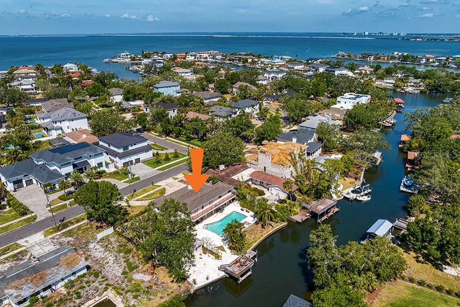 OVERSIZED WATERFRONT LOT IN SUNSET PARK — BUILD THE HOME YOU’VE BEEN WAITING FOR. VALUE IS IN THE LAND!
Situated on a rare 120x151 lot (approx. 18,120 SF), this property offers exceptional space and 120 feet of waterfront on a canal with direct access to Tampa Bay and the Gulf. A raised dock and boat lift are already in place. Whether you’re envisioning a custom estate, a pool, or expansive outdoor living, the size and location give you the opportunity to create something truly special.
Located in the highly sought-after Sunset Park neighborhood and zoned for top-rated schools: Dale Mabry Elementary, Coleman Middle, and Plant High. Also convenient to many of Tampa’s top private schools, shopping, dining, the Westshore District, Tampa International Airport, downtown, and bridges to St. Pete and the beaches.
The existing home and pool are not warranted. Property experienced flooding and is being sold AS-IS for land value only.