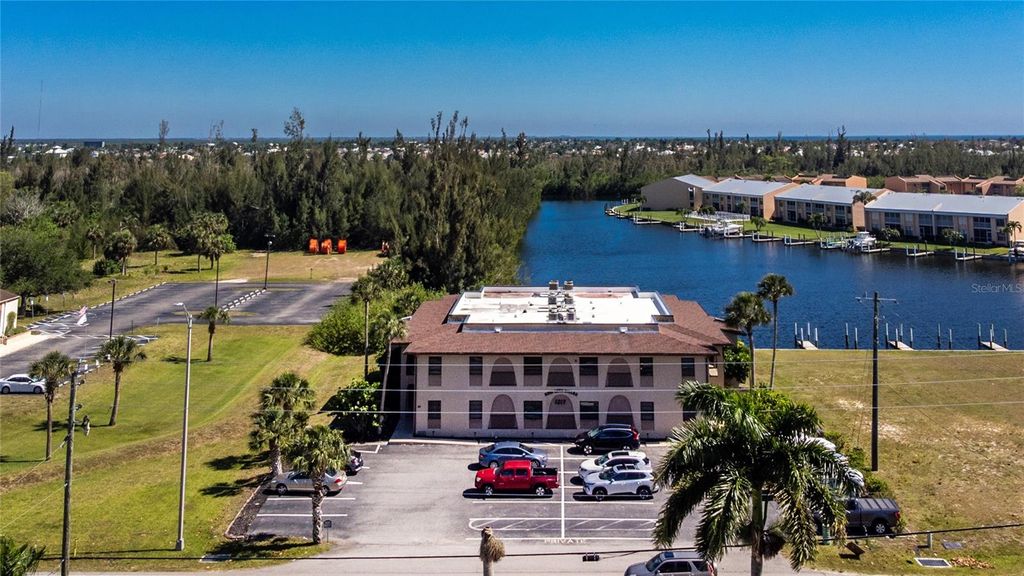 Photo of 1217 Aqui Esta Drive #8, Punta Gorda, FL 33950 (MLS # C7525531)