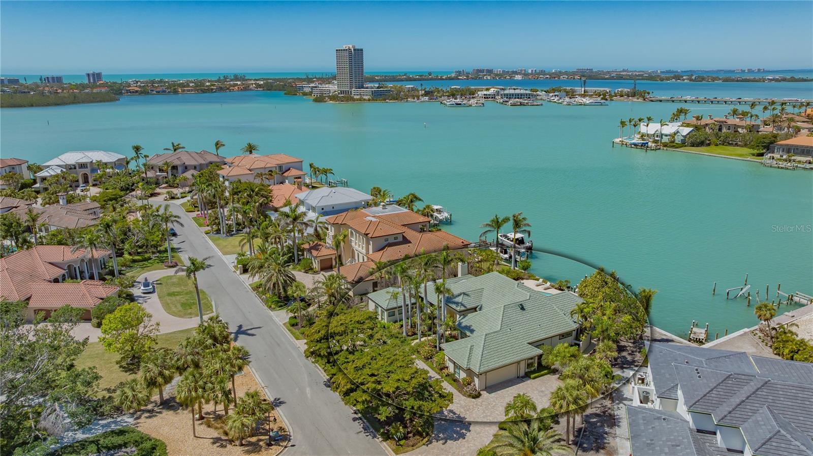 $500,000 PRICE REDUCTION — NOW IS YOUR CHANCE TO OWN COASTAL LIVING!
Experience waterfront living with this Bird Key estate. This is a rare opportunity to own a slice of paradise at unmatched value.
Step into coastal living with breathtaking bay views and unique design. This residence features three spacious en-suite bedrooms, including an expansive primary suite that serves as a private sanctuary. Wake up to panoramic water views, unwind in the spa-like hydra jet bath, framed by bay windows, and enjoy the luxury of dual walk-in closets, dual vanities, and a separate shower.
Designed for both comfort and entertaining, the home boasts rich oak flooring, a cozy fireplace, and custom cherry-wood cabinetry. The open layout flows seamlessly through double glass doors to a spacious lanai, perfect for enjoying morning coffee or evening cocktails by the free-form pool.
The chef’s kitchen is a culinary dream, featuring premium appliances, a six-burner, dual oven Dacor gas stove, cherry cabinets, and a center island, ideal for preparing gourmet meals. A 146-bottle Sub-Zero wine refrigerator awaits your next gathering. Outside the oversized patio offers multiple seating areas, while the private boat dock, with a 16,000 lb. lift, invites you to explore the bay, fish, or watch for dolphins and manatees.
A circular paver driveway, lush landscaping, and majestic Royal Palms welcome you home in style. Bird Key residents also enjoy access to a private marina and clubhouse, perfect for social events and connecting with neighbors.
Do not miss this extraordinary opportunity to live the waterfront lifestyle you’ve always dreamed of.
Bird Key Sarasota Bayfront Living at Its' Finest.