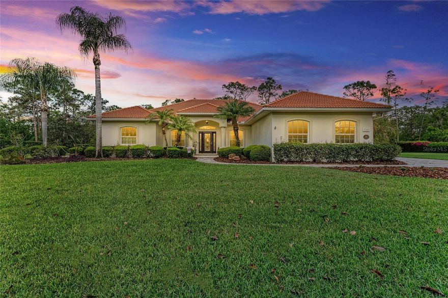 This exquisite custom-built 3-bedroom, 3-bathroom home with an office and den sits on over an acre in the Preserve at Panther Ridge, offering unparalleled privacy and breathtaking natural views.
Step inside and be welcomed by an elegant formal dining room, with a large window that allows natural light in. The spacious living room features a stylish accent wall and sliding glass doors that seamlessly blend indoor and outdoor living, leading to the resort-style pool area.
The gourmet kitchen has been beautifully remodeled, boasting new appliances, granite countertops, and a striking backsplash. Designed with an open-concept layout, it flows effortlessly into the inviting family room, where panoramic views of the pool and lush landscape create a serene ambiance.
A dedicated home office at the front of the house provides a bright and peaceful workspace, featuring custom-built double desks with a granite top, perfect for remote work or study. Additionally, a versatile den offers flexibility as a secondary living space or a potential fourth bedroom with scenic outdoor views.
The luxurious master suite is a true retreat, showcasing picturesque outdoor views, spacious walk-in closets, and a spa-like en-suite bath with double sinks, a garden tub, a walk-in shower, and granite countertops. Designed for privacy, this split-floor plan places the two additional bedrooms, den, and two bathrooms on the opposite side of the home—ideal for families or guests.
Throughout the home, gorgeous luxury vinyl flooring enhances the seamless, modern aesthetic.
Step outside to your own private oasis, where the resort-style pool beckons for relaxation. As the evening sets in, gather around the outdoor fire pit, soaking in stunning sunset views and the tranquility of nature.
** This exceptional home is loaded with premium upgrades, including:
* Hurricane-resistant windows with Kevlar curtains
*Whole-house water purification system
* Central vacuum system
* Built-in storage beneath the aquarium window
* Paver driveway and pool area
Living in The Preserve at Panther Ridge means embracing an active community lifestyle, with access to scenic walking trails, parks, a playground, basketball courts, and tennis courts. Plus, you’re just minutes from Waterside, Lakewood Ranch Main Street, and UTC Mall, offering premier shopping, dining, and entertainment.