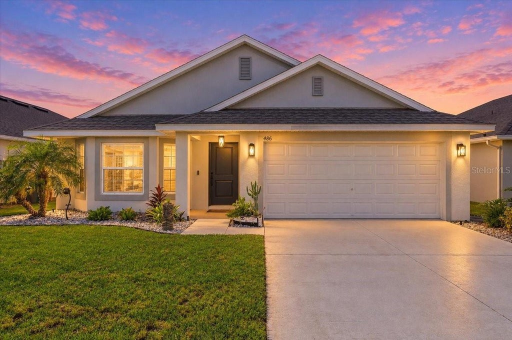 Photo of 486 Panaro Lane, Haines City, FL 33844 (MLS # O6445766)