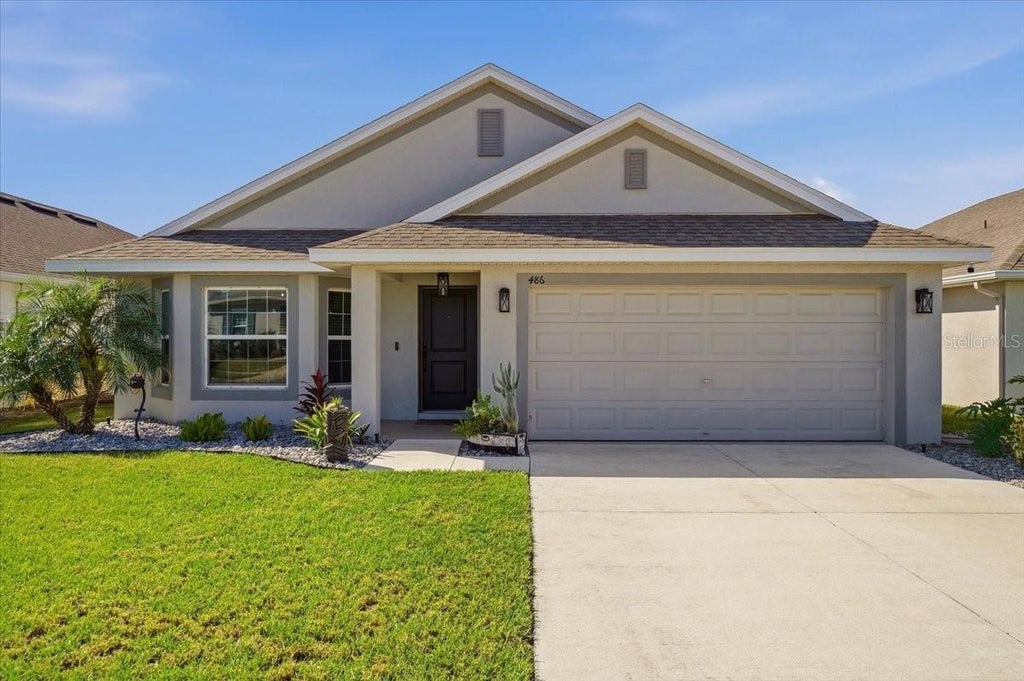Photo of 486 Panaro Lane, Haines City, FL 33844 (MLS # O6445766)