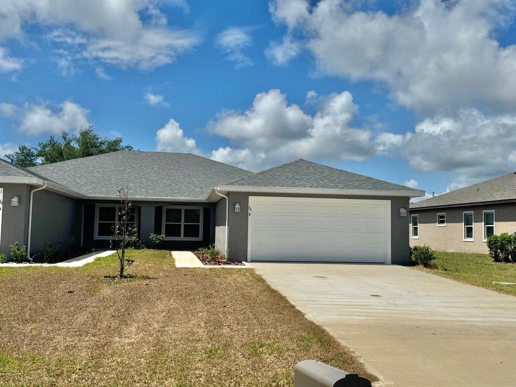 Photo of 36 Louisburg Lane #A &amp; B, Palm Coast, FL 32137 (MLS # FC318332)