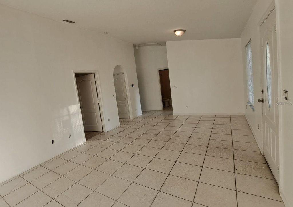 Photo of 6727 Magnolia Pointe Circle, Orlando, FL 32810 (MLS # O6371491)