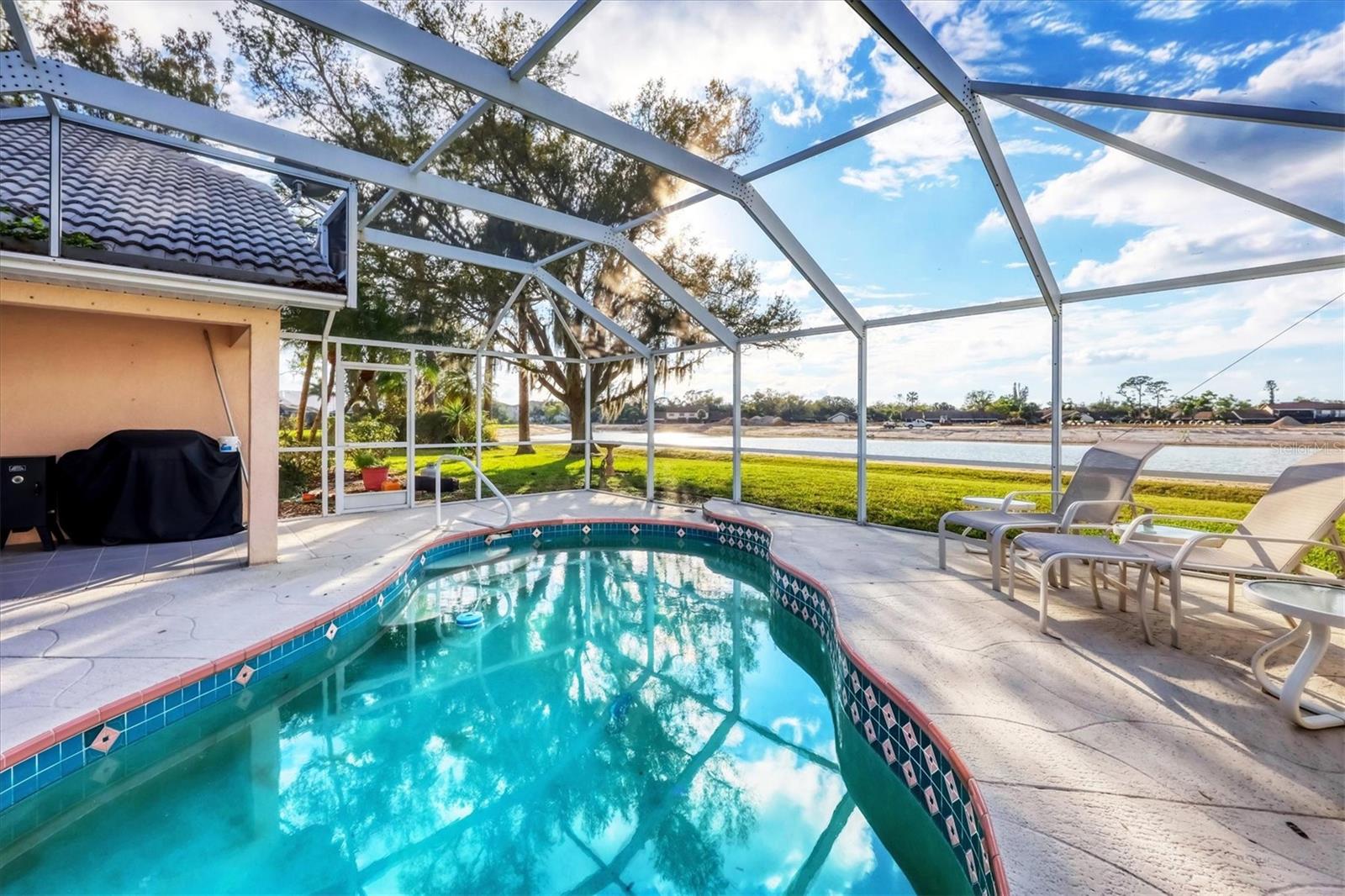 MOTIVATED SELLER! NOT FLOOD ZONE!
POOL HOME! PUBLIC WATER AND PUBLIC SEWER.
Welcome to a great opportunity to own an executive style home in the desirable city of North Port. POOL HOME! NOT FLOOD ZONE.PUBLIC WATER AND PUBLIC SEWER. Situated in a vibrant and thriving community minutes away from Warm Mineral Springs, this property promises a lifestyle filled with abundant sunshine, natural beauty, and coastal charm. This home benefits from its prime location, offering easy access to an array of amenities and attractions, yet offers PRIVACY! These are just a few of the upgrades and meticulous upkeep of this spectacular home.Sliders from the formal living room lead you to the large lanai and sparkling pool.Discover the many nearby pristine Gulf beaches, where you can bask in the sun, partake in water activities, or simply relish the tranquility of the gulf . Embark on nautical adventures from the sea conveniently located marinas, allowing you to explore the region's captivating waterways and nearby islands. Fishing enthusiasts will delight in the world-class fishing opportunities, while golf aficionados can indulge in a variety of renowned golf courses. Cool Today Park is just moments away and the spring training home of the Atlanta Braves. It holds many other activities there as well besides baseball. North Port is known for its thriving shopping and dining scene, featuring a diverse range of retail centers, boutiques, and restaurants. Immerse yourself in the vibrant downtown area, boasting charming shops, art galleries, and entertainment venues. The city hosts numerous cultural events, festivals, and community gatherings throughout the year, ensuring there's always something exciting happening. Lose yourself in the beauty of Charlotte Harbor Preserve State Park, where scenic trails, wildlife sightings, and peaceful waterways await exploration. Myakka River State Park is another nearby gem, enchanting visitors with its stunning landscapes and diverse flora and fauna. Nature enthusiasts will find endless opportunities to connect with the outdoors just moments away from this property. North Port also boasts excellent educational institutions, reliable medical facilities, and convenient transportation options. The city's welcoming community and strong sense of belonging make it an ideal place to establish roots and create lasting memories. Do not miss out on this exceptional opportunity to craft your dream home or invest in a prime location. Schedule a showing today and begin envisioning the endless possibilities offered by this remarkable property!