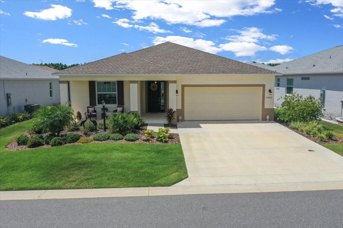 Better Than New! 2023 Sunflower Model – Exceptional Value in Weybourne Landing! This better-than-new 2023 Sunflower model is a standout opportunity in Weybourne Landing, offering incredible value and the lowest HOA fees in OTOW at just $220.75 per month!
From high-end finishes to integrated smart home features, every detail in this home has been carefully curated for comfort, convenience, and modern style. Step inside to an open floor plan highlighted by 20x20 ceramic tile flooring throughout the main living areas. The gourmet kitchen is a chef’s dream, featuring a gas range, quartz countertops, and custom flat-panel cabinets with elegant crown molding. Under-cabinet lighting and designer pendant lights over the island add warmth and ambiance. The primary suite offers a peaceful retreat, complete with an upgraded walk-in shower with built-in bench, and plenty of space for relaxation. Enjoy Florida living year-round from the screened lanai, or catch breathtaking sunsets from your front porch. Additional highlights include: Alexa-enabled smart home system, Gas dryer hookup, Laundry room plumbed for a sink, Upgraded ceiling fans throughout, Custom landscaping with sprinkler system and drip lines for low-maintenance beauty. All of this is ideally located close to shopping, dining, and top-rated medical facilities. Don’t miss your chance to own this move-in-ready, beautifully upgraded home in one of the most desirable 55+ communities in Ocala!