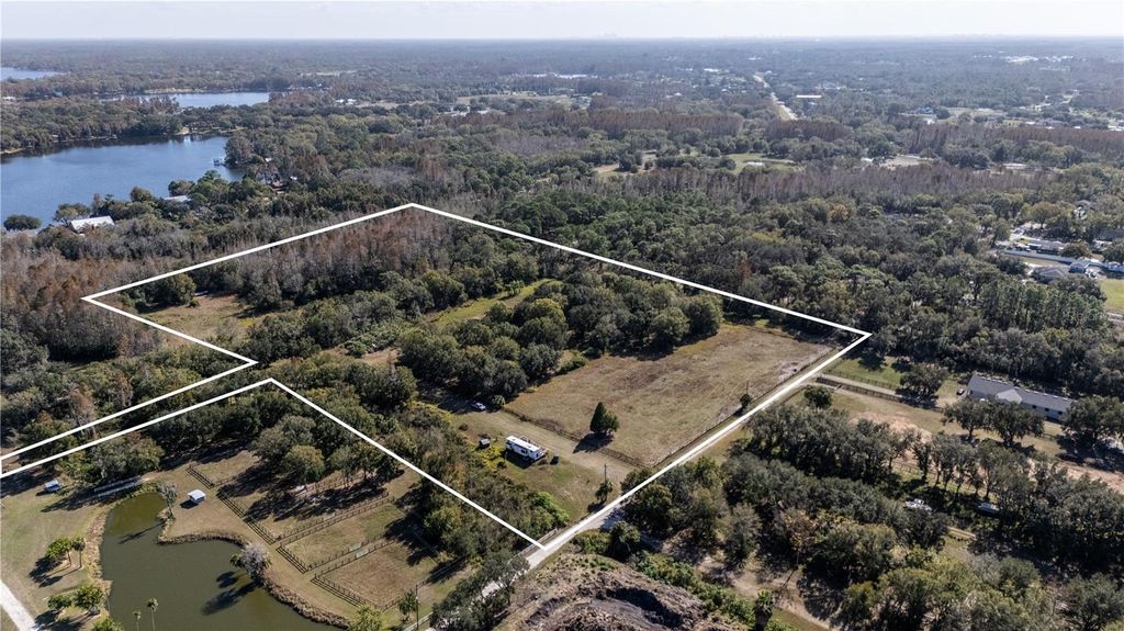 Photo of 11560 Tarpon Springs Rd, Odessa, FL 33556 (MLS # TB8480455)