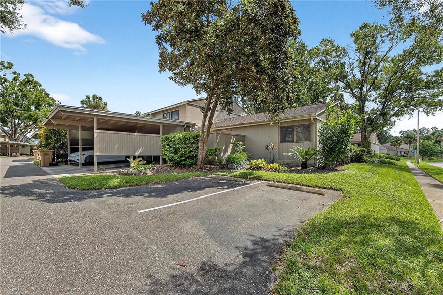 One or more photo(s) has been virtually staged. This condo has two outdoor spaces and lots of storage inside and out, including rare personal outdoor storage for bikes, tools, and holiday decor.  Starting at the private, screened, and fenced courtyard inside to the 3 Bed, 1 1/2 Bath floorplan, you are welcomed at the spacious kitchen which overlooks the dining area and great room. There are sliders to a smaller fenced and screened patio that provides another outdoor space to enjoy with cooler weather right around the corner.  The first floor is complete with a half-bath, laundry closet, a large storage area off the kitchen that could also work well as a home office nook, and more storage space under the stairs.  Head upstairs to a spacious primary bedroom, a large, full bath, and two secondary bedrooms.  Winding roads and mature trees are hallmarks of this established community in Temple Terrace with a clubhouse, tennis courts, and pools. Located near the VA Office, USF, an Amazon Fulfillment center, as well as easy I-75 and I-4 access for commuters.