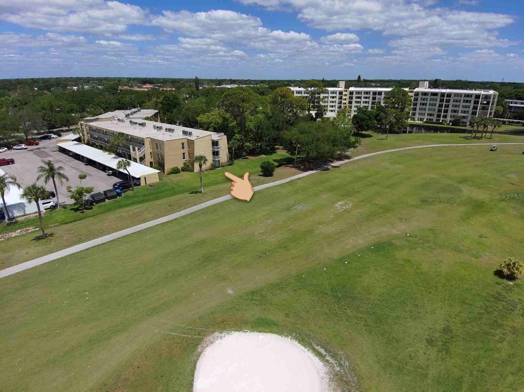 Photo of 225 Country Club Drive #D142, Largo, FL 33771 (MLS # TB8525826)