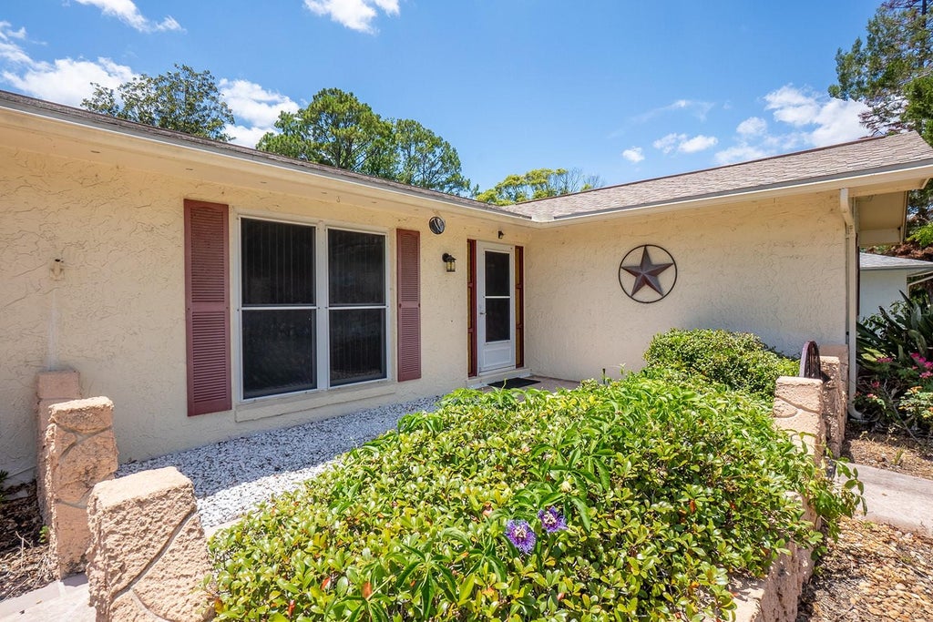 Photo of 113 Farragut Drive, Palm Coast, FL 32137 (MLS # FC319135)
