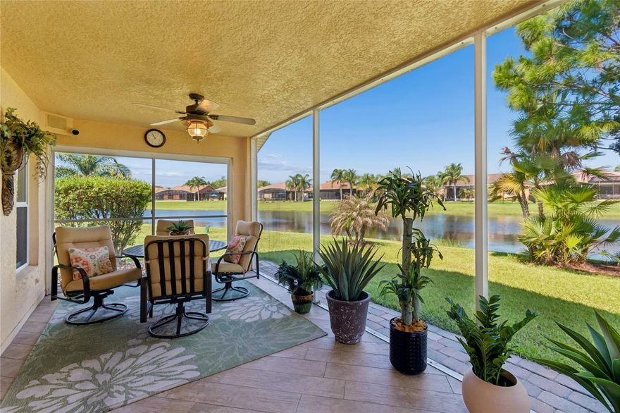 Beautiful Zinfandel model featuring a 30x12 SCREENED lanai with serene WATER and CONSERVATION  views. This move-in ready home offers VAULTED CEILINGS and diagonal PLANK  WOOD-LIKE TILE FLOORING and CROWN MOLDING  throughout, including the lanai for easy maintenance and seamless indoor/outdoor living. Updated kitchen includes 42" cabinets, pantry with custom SLIDE-OUT SHELVES, GRANITE countertops, SOFT-CLOSE DRAWERS, STAINLESS STEEL APPLIANCES breakfast bar, eat-in nook, and a SOLAR TUBE providing natural light. Open floor plan overlooks dining and living areas, ideal for entertaining. Energy-efficient Low-E DUAL PANE WINDOWS and DOORS installed throughout (2021). HVAC REPLACED IN 2020. Sliders lead to covered lanai with picture window screen enclosure offering expansive, unobstructed views. PRIMARY SUITE features direct lanai access, walk-in closet, linen closet, and a POCKET DOOR leading to the ENSUITE BATH for added privacy. Ensuite bath upgraded with custom TILED-WALK IN SHOWER, GLASS VESSEL SINK, modern mirror, and solar tube for enhanced natural lighting. Split bedroom layout with second bedroom at front of home offering privacy for guests and adjacent full bath featuring GRANITE countertops, a PATTERNED VESSEL SINK, updated mirror and a tub with glass shower door enclosure, along with a solar tube for natural light. Garage includes extended cabinets with countertop workspace, UTILITY SINK, pull-down attic stairs, and a separate laundry closet with WASHER and DRYER INCLUDED. Aluminum hurricane shutters provide added peace of mind. Additional features include ROUNDED CORNERS and upgraded lighting and ceiling fans throughout. Enjoy peaceful outdoor living with both water and conservation views, this home is a MUST SEE!! The HOA: - maintains the LANDSCAPING & IRRIGATION systems in the common areas as well as at individual homesites - maintains the roads throughout the community - PROVIDES SECURITY with gate guards and mobile patrols including the Polk County Sheriff - allows AUTOMATED GATE ACCESS for residents via license plate readers - provides residents with Fiber Optic Internet & TV service.***Poinciana Lakes Plaza is a MAJOR NEW SHOPPING CENTER directly across from the Solivita Main Gate. It features Sprouts Grocery, TJ MAXX, Ross, Burlington, Rack Room Shoes, 5 Below, Ulta, Outback, First Watch, 5 Guys, Panda Express, Bojangles, Jersey Mike's Subs, 5 Guys, Papa John's Pizza, Burrito Bar, Cold Stone Creamery, Urgent Care, Dentist, Hand & Stone Massage, America's Best Eyeglasses, Crunch Fitness, Hair Cuttery, Petco, TD Bank, Verizon Mobile, PLUS MORE TO COME.***