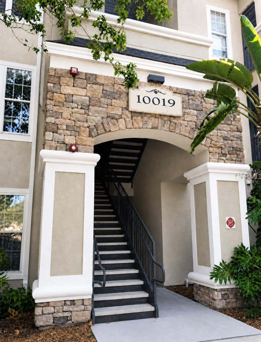 Photo of 10019 Courtney Palms Boulevard #103, Tampa, FL 33619 (MLS # TB8539350)
