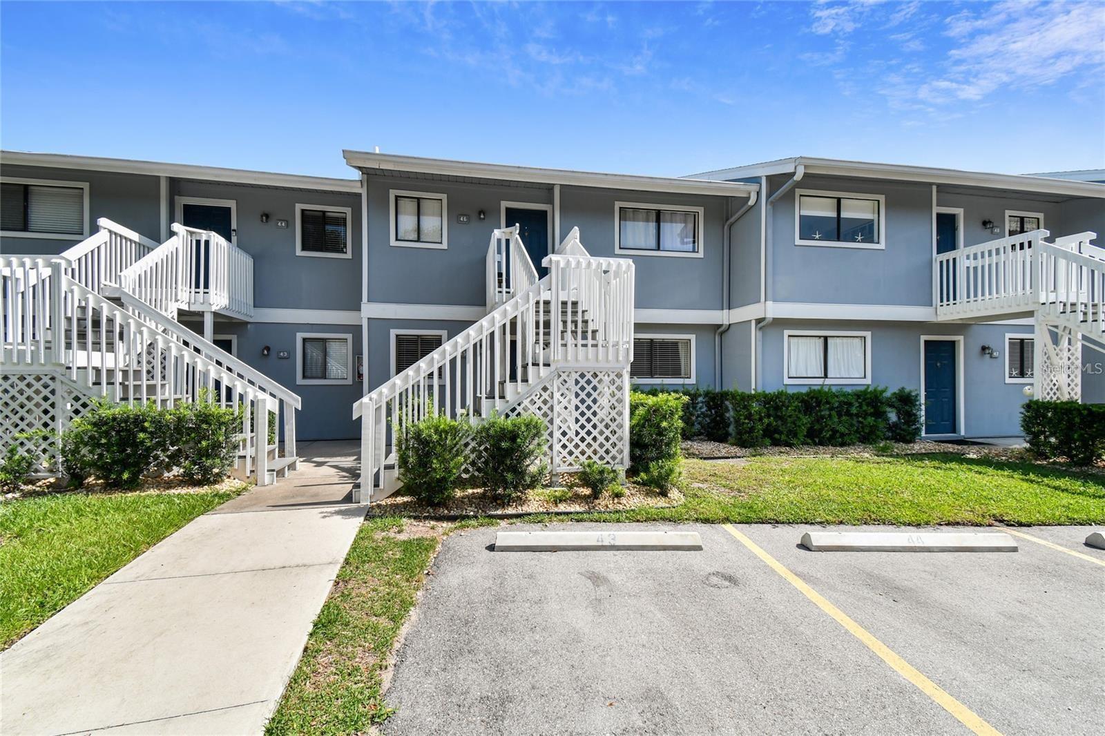 AMAZING PRICE IMPROVEMENT ~~ LUXURY CAN BE VERY AFFORDABLE. Enjoy the Florida lifestyle in this desirable ground floor condo boasting serene pond views in the coveted Harbor Pines community. Move-in Ready, you will enjoy stepping into this meticulously maintained and easy care residence that is being sold complete with FURNITURE and some furnishings. The heart of the home is the kitchen, a chef's dream, featuring newer appliances, wood cabinetry, granite countertops and expansive breakfast bar with storage. The open floor plan seamlessly connects the kitchen to the dining area and living room, graced with recently painted neutral walls, tiled floors set on the diagonal for added interest creating an inviting space for entertaining or just relaxation. This spacious condo offers split plan for privacy. The Master Bedroom offers an en-suite bath for personal privacy. Escape to your own private oasis on the screened lanai overlooking the tranquil pond, where pavers extend to a charming patio, perfect for enjoying the serene surroundings and evening breezes. Additional features include a small storage closet on the lanai, inside laundry utility closet, designated parking space. Harbor Pines provides exciting amenities to include a sparkling pool, fitness center, clubhouse, tennis courts/pickle-ball courts providing opportunity for enjoyment and meeting your neighbors. Conveniently located just minutes away from IMG Academies, shopping, dining, downtown Sarasota AND Bradenton and award-winning beaches, this condo offers the perfect blend of luxury, convenience, and tranquility.