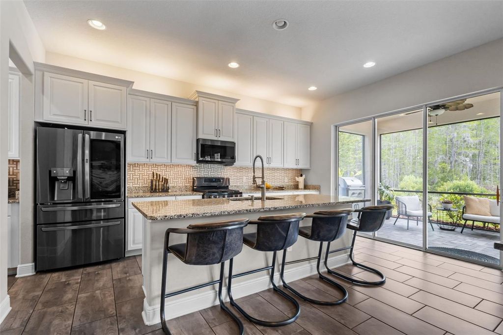 Photo of 2962 Long Bow Way, Odessa, FL 33556 (MLS # TB8491335)