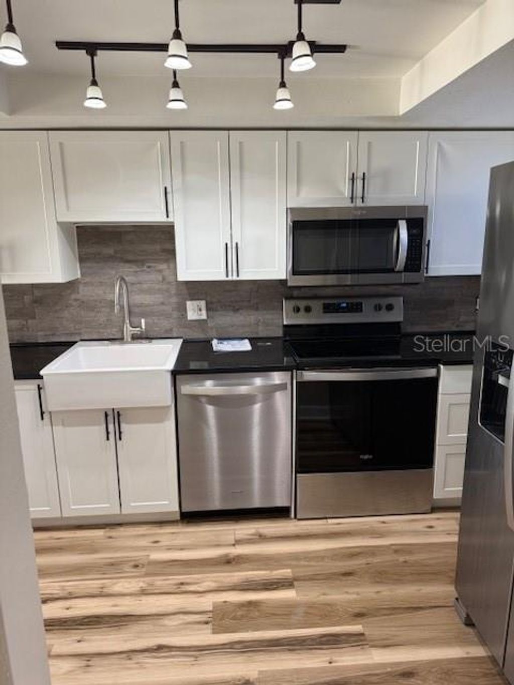 Photo of 3823 N Oak Drive #K11, Tampa, FL 33611 (MLS # TB8465080)