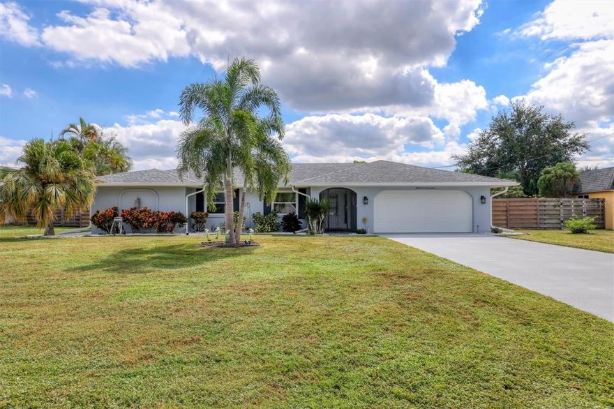One or more photo(s) has been virtually staged. Welcome to 3724 Calliandra Drive, located in the desirable Glen Oaks Country Club Estates. This 3-bedroom, 2-bathroom pool home features a split floor plan across 2,019 sq ft of living space. The home has been substantially updated and lovingly maintained, including an updated kitchen and bathrooms, new tile flooring, impact windows, and a newer roof (2019). The property offers an ideal layout with two main living areas that both open to the screened lanai and pool perfect for entertaining and enjoying the indoor/outdoor Florida lifestyle. The spacious primary suite features his-and-hers closets and a large walk-in shower. Additional highlights include a 2-car garage and an oversized laundry room with abundant storage. Situated on a generously sized lot, fully fenced with mature landscaping and a beautiful garden providing both privacy and charm. Ideally located to enjoy everything Sarasota has to offer from the shops and restaurants of University Town Center to the boutiques and dining of St. Armands Circle, the arts and culture of downtown