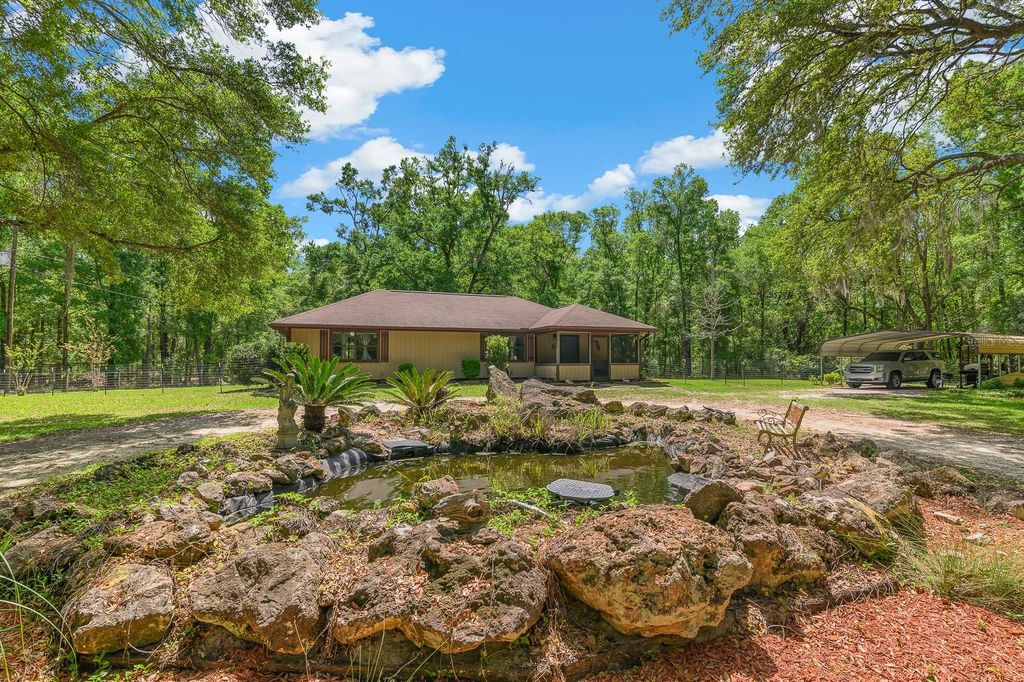 Photo of 23719 NW 142nd Avenue, High Springs, FL 32643 (MLS # GC534878)