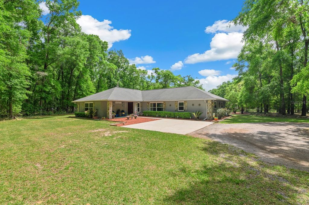 Photo of 23719 NW 142nd Avenue, High Springs, FL 32643 (MLS # GC534878)