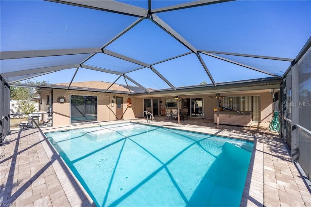 Photo of 1314 SE 43rd Terrace, Cape Coral, FL 33904 (MLS # C7523746)