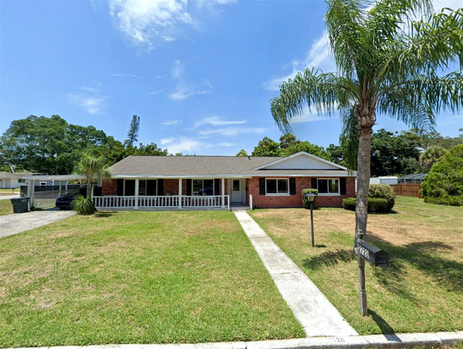Welcome to this expansive 4-bedroom, 3-bath home that offers the perfect combination of style, space, and an unbeatable location. Ideally situated west of the trail, just one mile from downtown and directly across from a beautiful park, this home is also close to excellent schools—making everyday living convenient and effortless. Set on a rare triple corner lot spanning over half an acre, the property offers exceptional outdoor space, a fully fenced yard, and room to relax, entertain, or even expand. Inside, the home has been beautifully updated and meticulously maintained, offering peace of mind with major upgrades already completed. The spacious layout includes two generous living areas, two fireplaces, and a large sunroom filled with natural light. In 2020, new tile flooring in main areas, as well as a new HVAC system for year-round comfort. The kitchen was stylishly remodeled the same year with high-end cabinetry, a sleek concrete countertop, a stainless steel apron sink, a glass cooktop with hood, and a stainless refrigerator—all designed to inspire any home chef. A wall oven and microwave combination unit were added in 2025, completing the modern look. All three bathrooms are full-sized and updated with striking tile surrounds and decorative accents. The luxurious master suite features dual vanities with new cabinetry (2025), a spa-like bath, and a dream walk-in closet. Two of the four bedrooms are en-suites, offering the ideal setup for multi-generational living or guests who want privacy and comfort. Additional improvements include hurricane-rated windows in the living room (2024) and brand-new windows with hurricane shutters in the Florida room (2025), along with a new exterior sliding glass door and exterior doors in both the utility room and Florida room. Fresh drywall, recessed lighting, new ceiling fans in multiple rooms, updated light fixtures, and new mirrors installed in 2025 elevate the entire space. The home was professionally tented for termites in April 2025, and the transferable one-year warranty provides added confidence for the new owner. With cedar closets, a bright and open layout, and premium finishes throughout, this move-in ready home truly has it all—style, space, comfort, and a location that’s second to none. Opportunities like this are rare. Come see it today and fall in love!