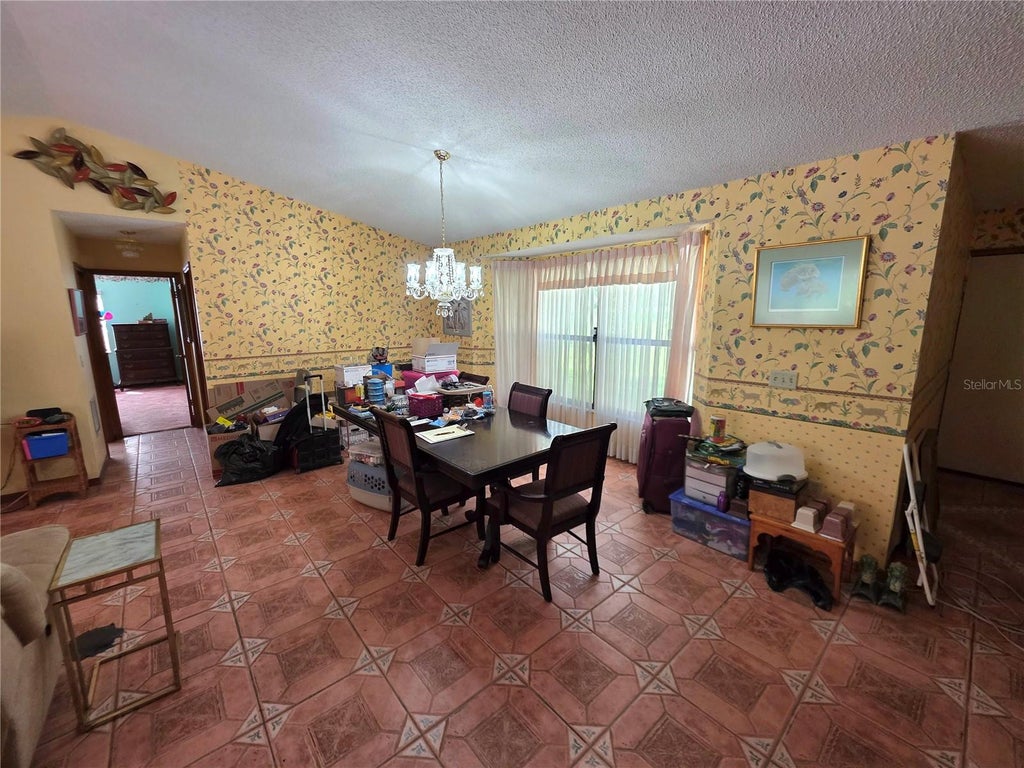 Photo of 905 S Mildred Avenue, Brooksville, FL 34601 (MLS # W7890711)