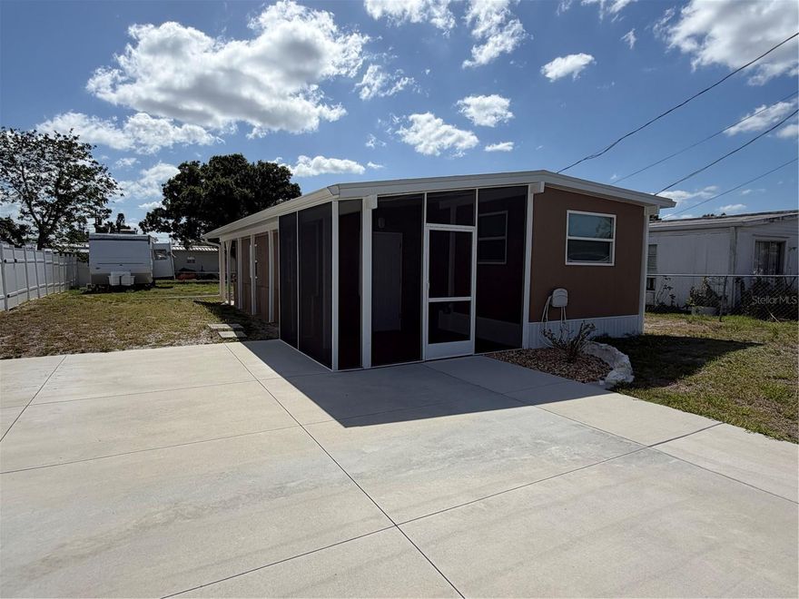Not your average mobile, this home is listed as a single wide with an effective date of 2007.  Truth is there is no evidence of a mobile home, this property has textured drywall finishes with rounded corners, Luxury Laminate flooring, a beautifully tiled shower with glass doors, updated appliances, frankly it shows like a model home.  This home is perfect for the Seasonal visitor, low maintenance, modest taxes and no HOA, you can park your boat or motor home on your fenced lot without restriction. All of this and less than 3 miles from the Gulf of America and the beautiful beaches of Venice Florida.  Make this home your PARADISE destination.