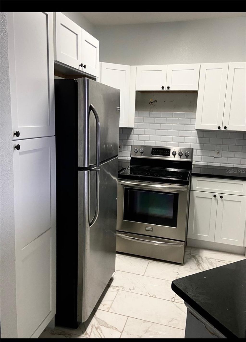 Photo of 6412 Queens Borough Avenue #315, Orlando, FL 32835 (MLS # S5153222)