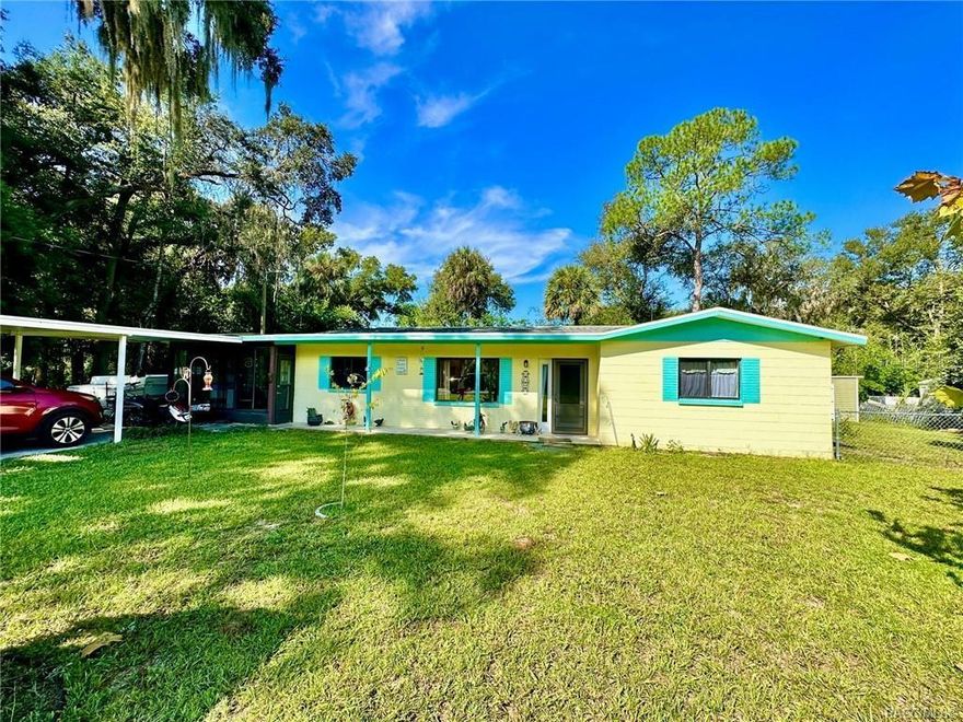 This charming home features almost 1200 square feet of living area with 3 bedrooms, 2 bathrooms, family room, spacious kitchen, enclosed porch that is the perfect place for your morning cup of coffee. The home sits on .36 of an acre, the fenced backyard has a large above-ground pool that is partially screened and has a wood deck for sunbathing. There are multiple sheds to store all of your lawn equipment and toys. Conveniently located near the intersection of Hwy 44 and Hwy 486 behind Publix