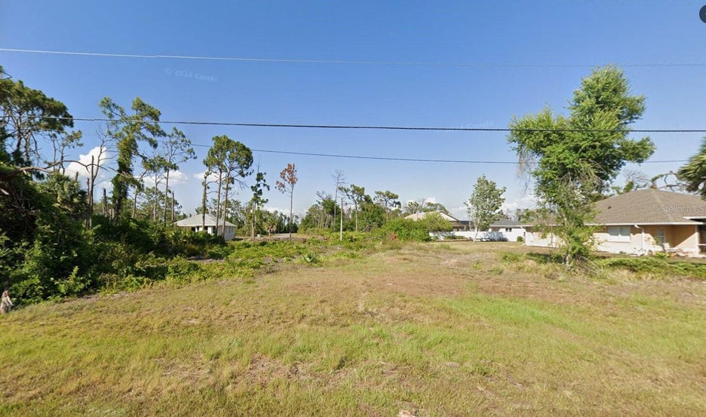 Photo of 114 Wahoo Drive, Rotonda West, FL 33947 (MLS # D6149388)