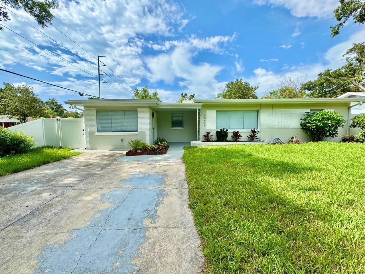 Welcome to this beautifully updated 3-bedroom, 2-bathroom home in the heart of Tampa! Brand new appliances, flooring, paint, bathrooms, and more. Thoughtfully renovated with modern touches throughout, this home offers both style and functionality for comfortable Florida living. Step into a stunning chefs kitchen featuring stainless steel appliances, sleek stone countertops, and a gorgeous tile backsplash perfect for preparing meals and entertaining in style. The open and airy floorplan is enhanced by wood-look laminate flooring that flows seamlessly throughout the home, creating a warm and inviting atmosphere. The spacious primary suite boasts a private en-suite bathroom with a walk-in shower, offering a relaxing retreat at the end of the day. For your convenience, a washer and dryer are included. Enjoy the best of indoor-outdoor living in the covered and screened lanai ideal for morning coffee, outdoor dining, or unwinding in the evenings. The fully fenced backyard is perfect for entertaining, pets, or simply enjoying the Florida sunshine. A storage shed provides extra space for your tools and gear. Conveniently located near shopping, dining, and all that Tampa has to offer, this move-in ready home is a must-see! In addition to the advertised base rent, all residents are enrolled in the Resident Benefits Package (RBP) for $50.00/month which includes HVAC air filter delivery, credit building to help boost your credit score with timely rent payments, utility concierge service making utility connection a breeze during your move-in, and much more! More details upon application. Lawn care included in rent. Pets welcome, no aggressive breeds, max 2, 35 lbs. Vacant and Available now!