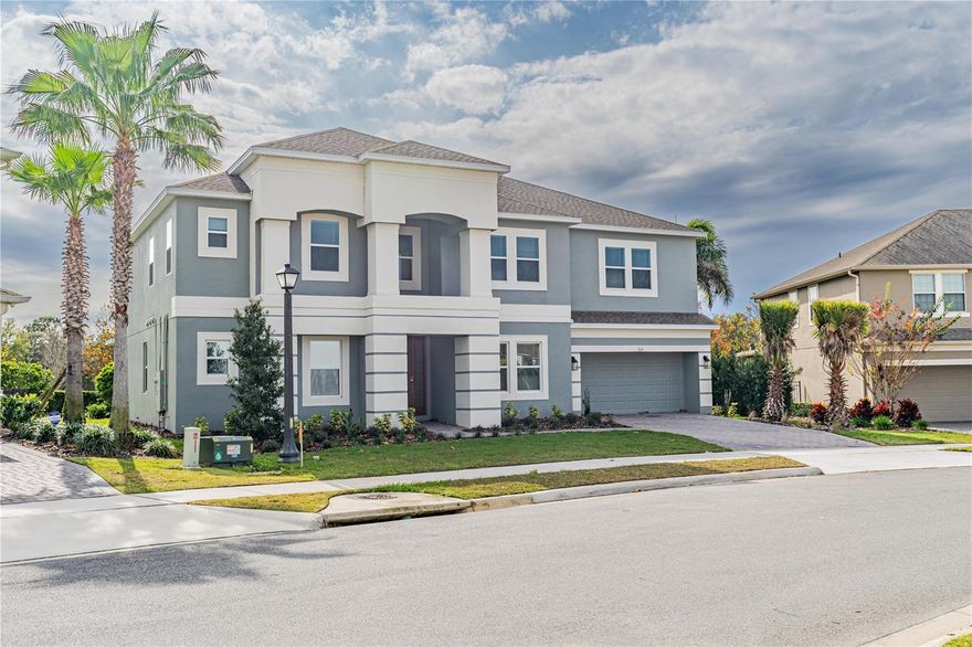 This magnificent five-bedroom residence offers a splendid open-concept living space adorned with modern touches throughout. As you step through the entrance foyer, a refined study graces the right side, while a gracious dining room awaits on the left. The heart of the home unfolds into a spacious family room, creating a welcoming and expansive central hub.
Structural enhancements incorporated into 512 Bellflower Way include oak treads, a tray ceiling, a gourmet kitchen, pavers, a study, a second suite on the second floor, a secondary bath with a shower, an additional bathroom, an outdoor kitchen rough-in, a covered extended lanai, 8' interior doors, pre-plumbing for a future laundry sink, and pool/spa pre-wiring. This meticulously designed home combines functionality with luxury, creating an ideal living space for modern lifestyles.

Clermont is situated amidst the picturesque Lake County, with numerous lakes dotting the landscape. Residents enjoy breathtaking views and outdoor activities, including boating, fishing, and hiking.