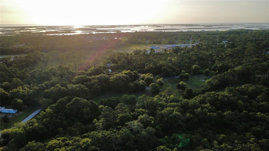 Photo of 327 Beaverbrook Lane, Oak Hill, FL 32759 (MLS # O6385341)