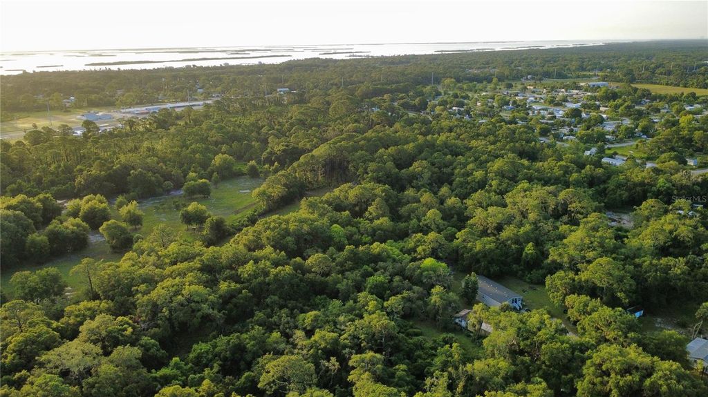 Photo of 327 Beaverbrook Lane, Oak Hill, FL 32759 (MLS # O6385341)