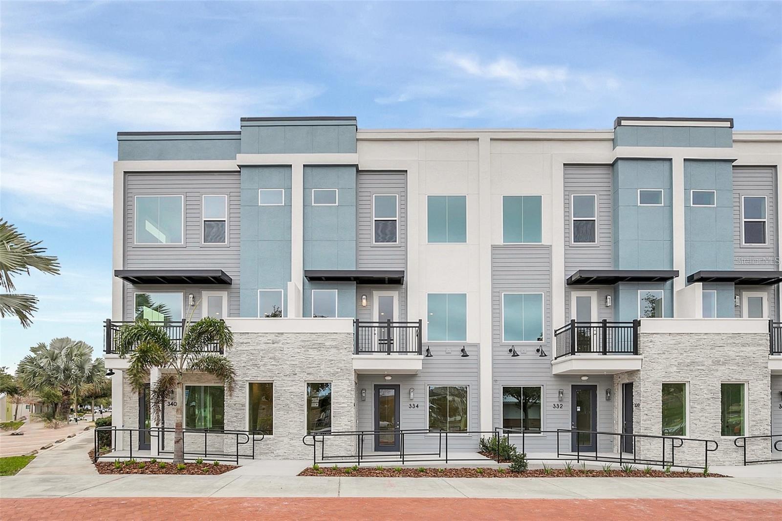 One or more photo(s) has been virtually staged. Welcome to your next chapter in style, sophistication, and unmatched convenience! This brand-new, three-story luxury townhouse is more than just a place to live — it’s a lifestyle. Perfectly positioned in the vibrant City Place at Oviedo on the Park, this one-of-a-kind residence offers breathtaking views of a tranquil pond, lush green parkland, and the pulse of the city’s best shops and eateries — all right outside your doorstep. Step inside a thoughtfully designed 3 Bedroom, 2.5 Bathroom home boasting high-end finishes, designer lighting, and an open-concept main floor bathed in natural light. Enjoy stunning luxury vinyl plank flooring, a gourmet kitchen with quartz countertops, oversized island with seating, wine fridge, and double pantry – perfect for entertaining or everyday indulgence. The private owner’s suite is your personal retreat with a spa-inspired en-suite bath and an expansive walk-in closet. Sip morning coffee or unwind in the evening from your balcony overlooking city lights, park views, and serene water features. Water utility is included in the rent for added convenience.Elevate your business presence with an optional 600+ sq ft walk-up commercial storefront/office space on the ground level, available for lease at just $3,000/month. Featuring oversized signage windows, a private entrance, restroom, and unbeatable visibility, this space is ideal for professionals, creatives, and entrepreneurs. With direct access from your private residence, enjoy the ultimate "commute" — just steps away. With over 50 destinations within walking distance, including restaurants, cafés, fitness studios, grocery stores, salons, and boutique shops, your weekends and evenings are always vibrant. Take a stroll around the scenic Center Lake, attend concerts at the amphitheater, or paddle the swan boats – everything you love is within reach. UCF, the Oviedo Gym & Aquatic Facility, and Waterford Lakes are just a short drive away.Additional features include a 2-car rear-load garage, electric vehicle charging station, private brick paver courtyard, separate entrances for home and office, and zoning for top-rated Seminole County schools. Whether you're a visionary entrepreneur, savvy investor, or someone craving the perfect blend of comfort and urban convenience, this property offers the ultimate flexibility for how you live and work. Call now to schedule your private tour and experience the unmatched energy of City Place — where luxury meets location.
