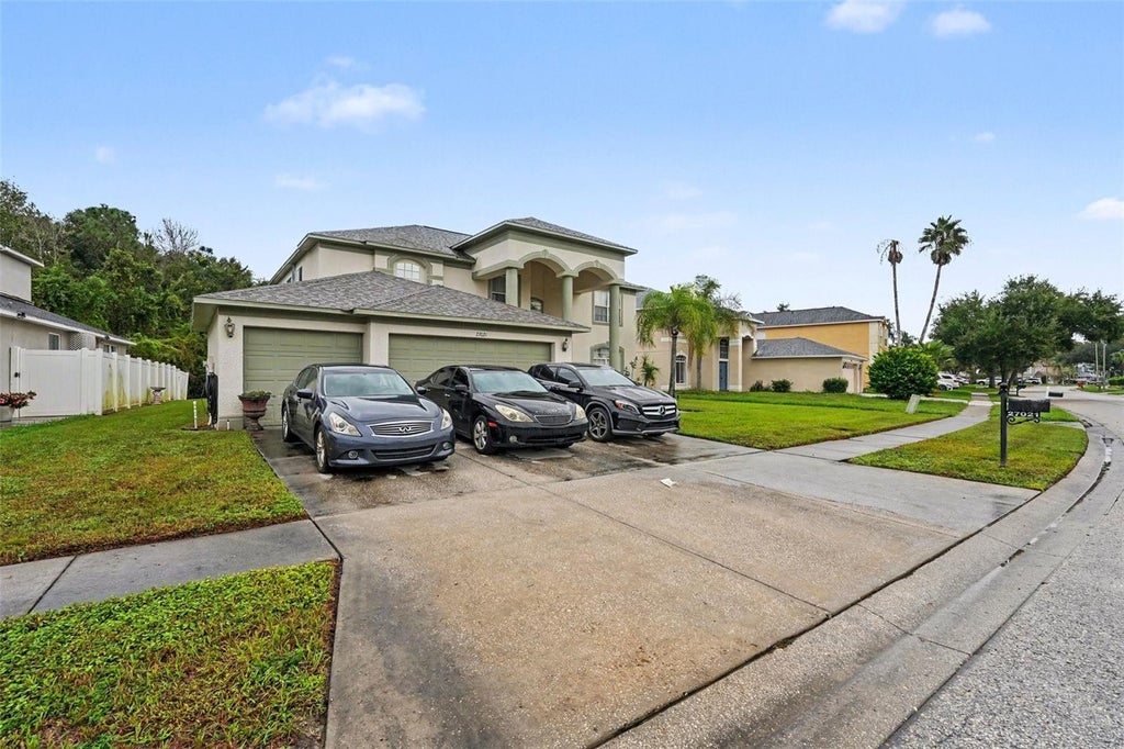 Photo of 27021 Coral Springs Drive, Wesley Chapel, FL 33544 (MLS # TB8559965)