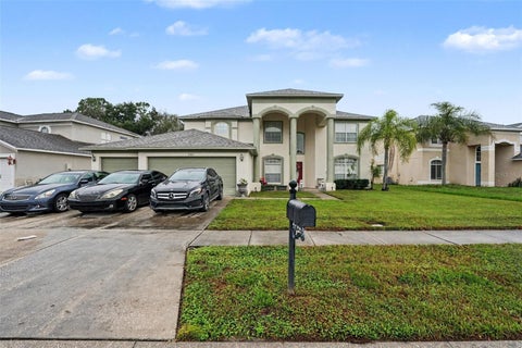 Photo of 27021 Coral Springs Drive, Wesley Chapel, FL 33544 (MLS # TB8559965)