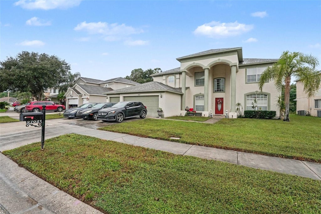 Photo of 27021 Coral Springs Drive, Wesley Chapel, FL 33544 (MLS # TB8559965)
