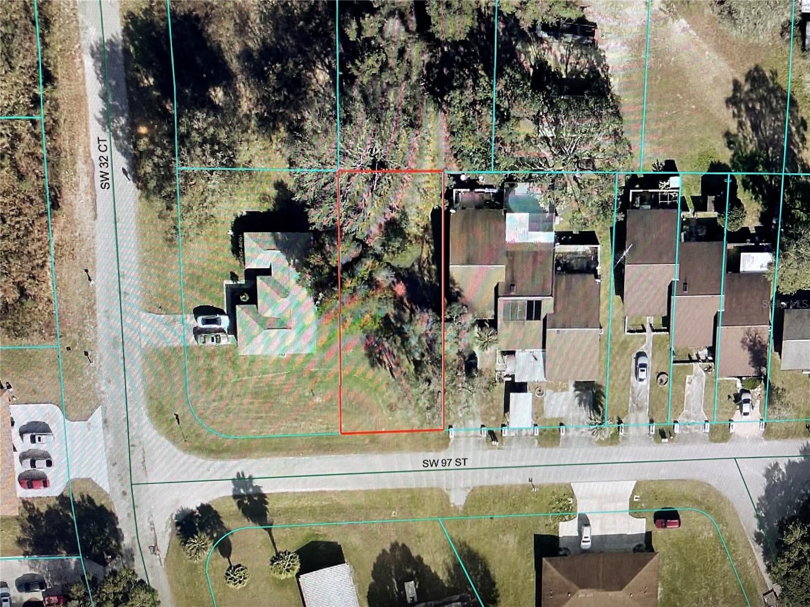 Vacant lot in Leighton Estates (.17 acre). No flood zone and no HOA. Buyer to verify with Marion County any info regarding mobile home or building options. For GPS, use address next door - 3135 SW 97th St.