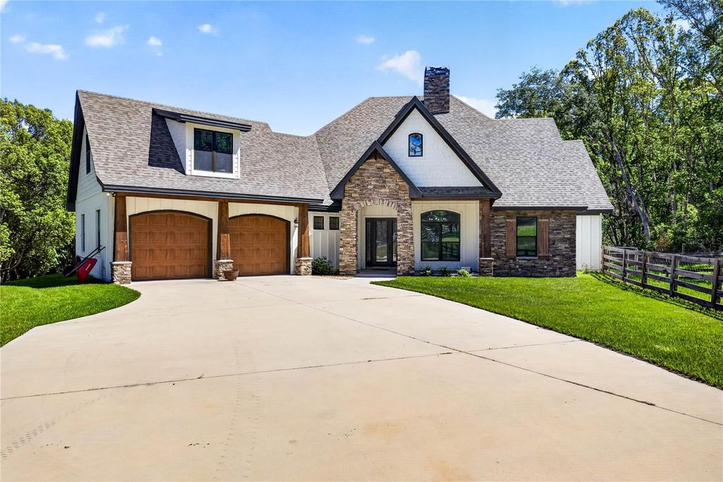 Photo of 17265 Meadow Bluff View, Dade City, FL 33523 (MLS # TB8517359)
