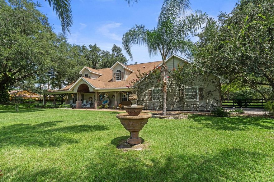 Escape to your own private estate on nearly 2.5 beautifully fenced acres — where luxury, space, and flexibility come together just minutes from downtown Mount Dora.

This stunning 4-bedroom home was designed for both everyday comfort and unforgettable entertaining. From the moment you step inside, you’re greeted by soaring cathedral ceilings, rich real wood flooring, and an open, inviting layout filled with natural light. Upstairs, a spacious loft with two separate sitting areas creates the perfect space for a media room, game room, home library, or additional lounge areas.

Privacy and convenience abound, with three of the four bedrooms featuring their own en-suite bathrooms — ideal for guests or multi-generational living. Start your mornings on the charming covered front porch, where you can unwind and take in the peaceful surroundings of this quiet, upscale neighborhood.

Recent upgrades provide added peace of mind, including a BRAND-NEW roof and BRAND-NEW water heater.

Step outside and discover your personal Florida oasis. The expansive screened lanai features a heated pool and spa, surround sound system, outdoor TV viewing, and built-in cooling misters — creating the ultimate year-round entertainment space for hosting family and friends in comfort.

What truly sets this property apart is the incredible 50’ x 52’ barn/garage with RV-height clearance — an exceptionally rare feature with endless possibilities. Perfect for car collectors, RV owners, hobbyists, contractors, or business owners, this versatile space has even served as an income-producing workshop in the past. Attached is a climate-controlled 12’ x 36’ office with A/C, making it easy to run a business or work from home without sacrificing living space.

The fully board-fenced property offers room for horses, recreational vehicles, and all your outdoor toys — and both the home and barn are located outside the flood zone for added confidence and value.

Despite the peaceful country setting, you’re only five minutes from the restaurants, shopping, festivals, and waterfront charm of downtown Mount Dora.

Meticulously maintained inside and out, this one-of-a-kind estate offers the rare combination of luxury living, functional workspace, income potential, and room to breathe. Possible seller financing with low interest may also be available.

Opportunities like this are exceptionally rare — schedule your private showing today and experience everything this extraordinary property has to offer