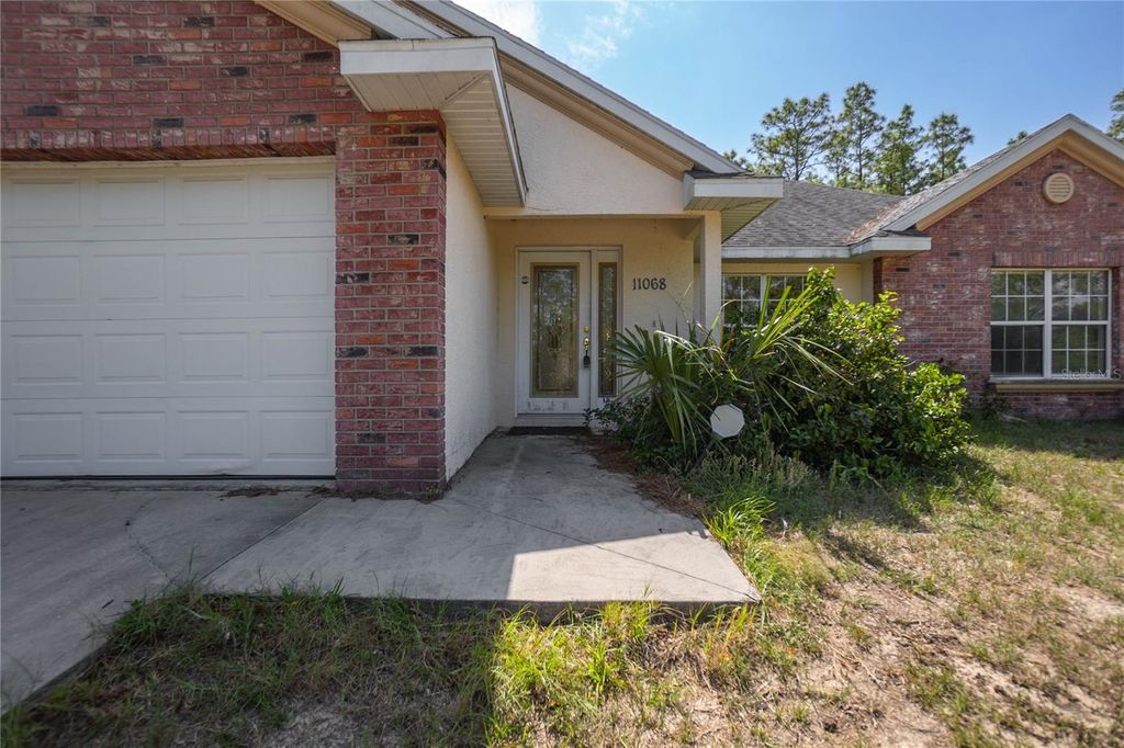 Photo of 11068 N Mataro Avenue, Citrus Springs, FL 34434 (MLS # OM707731)
