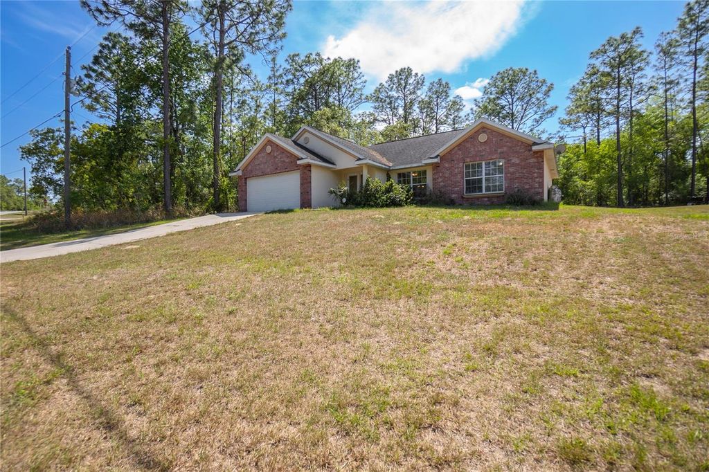 Photo of 11068 N Mataro Avenue, Citrus Springs, FL 34434 (MLS # OM707731)