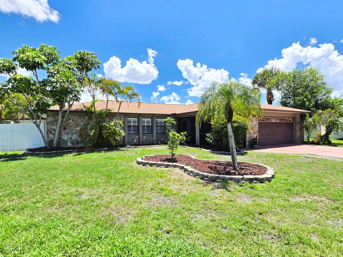 All offers will be considered. Tucked away on a quiet cul-de-sac in the desirable Georgetowne neighborhood, this renovated waterfront pool home offers peace, privacy, and everyday comfort on over 1.1 acres of lush, mature landscape. And it comes with a brand new May 2025 roof!
Step inside to an open, airy layout designed for both comfort and connection. The split-bedroom floor plan offers three generously sized bedrooms and two stylish baths. This home includes a living room, family room, formal dining area and bonus space to suit all of your needs. Enjoy the enhanced touches like the classic brick fireplace, and large windows to let in your tranquil water views. The updated kitchen boasts sleek quartz countertops and modern cabinetry.
Outside is where this home truly shines. Enjoy the best of Florida living with an extra large, screened-in lanai, outdoor kitchen, outdoor shower, and an expansive pool deck overlooking the water — perfect for entertaining, unwinding, or soaking in the sun. The mature landscaping provides privacy, shade, and a sense of retreat rarely found so close to town. Sitting on over 1.11 acres - you have plenty of space.
If you're searching for space, serenity, and style — all within a central Sarasota location — this home checks every box. Schedule your private showing today. All offers will be considered.