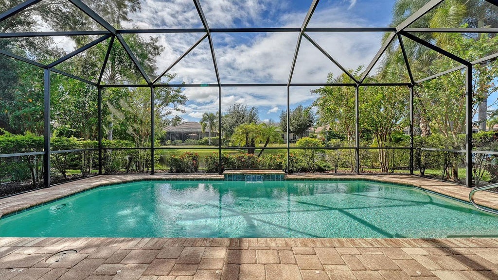 Photo of 14718 Leopard Creek Place, Lakewood Ranch, FL 34202 (MLS # A4709579)