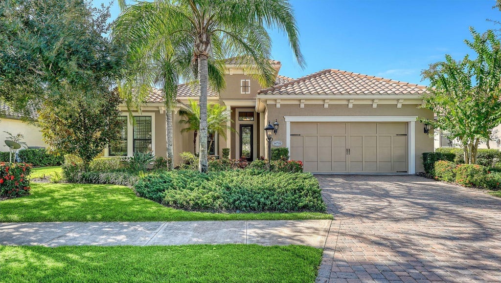 Photo of 14718 Leopard Creek Place, Lakewood Ranch, FL 34202 (MLS # A4709579)
