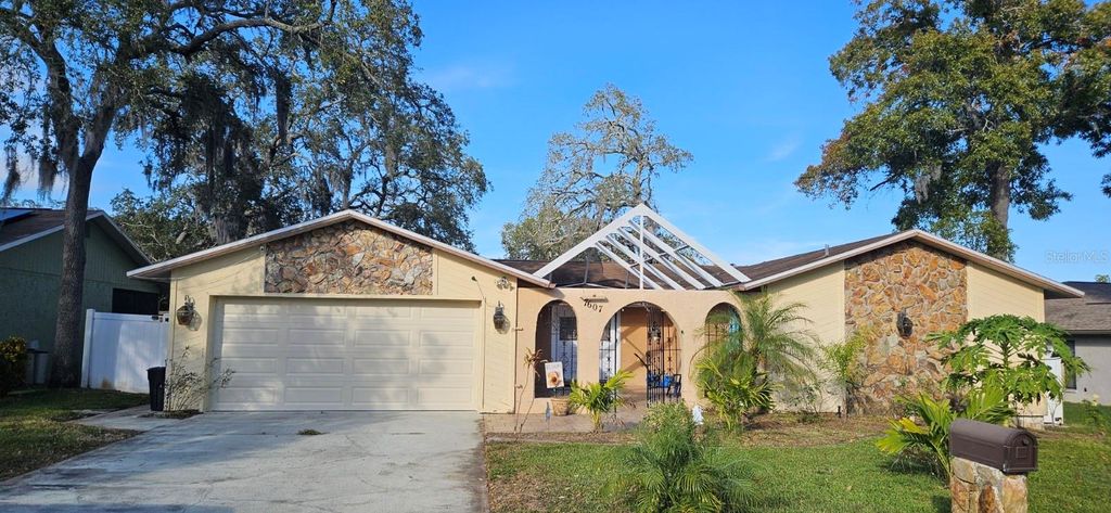 Photo of 7607 Tall Tree Court, Port Richey, FL 34668 (MLS # TB8455006)