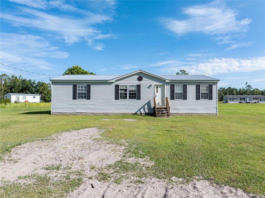 This well-maintained home offers the perfect blend of comfort and space with 3 bedrooms, 2 bathrooms, and a split floor plan. The living area flows into a bright kitchen and dining room. Enjoy the convenience of an indoor laundry room in the home. A durable metal roof provides peace of mind for years to come. Situated on 1.5 acres, there’s plenty of room for outdoor activities, gardening, or adding your personal touch. Located in peaceful Union County, this property offers the quiet of country living with easy access to nearby amenities.