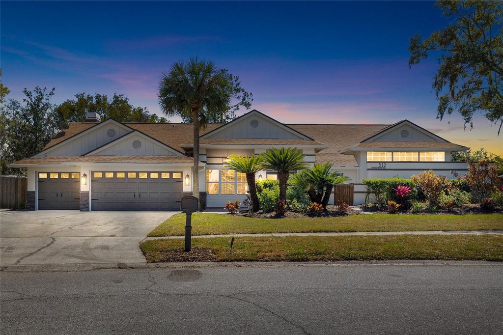 Photo of 512 Crystal Grove Boulevard, Lutz, FL 33548 (MLS # TB8480572)