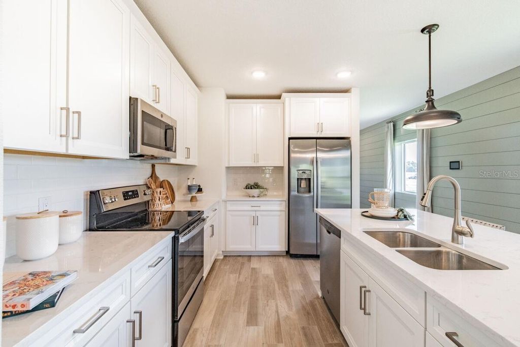 Photo of 1466 Sunset Preserve Way, Port Charlotte, FL 33953 (MLS # R4910334)